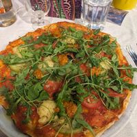 The seasonal vegan pizza with vegan cheese at Le Jardin des Pentes  in Lyon