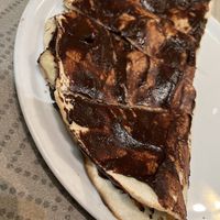 Pizza con crema di cioccolato fondente  at Le Jardin des Pentes  in Lyon