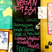 Vegan pizza with creamy vegan cheese at Le Jardin des Pentes  in Lyon