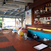 Outdoor seating area at Azul Shipwreck Cafe in St Thomas