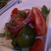 Heritage organic tomato salad plate at La Gioia in Paris