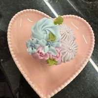 Cutest plates, amazing cupcake flavors and such talent on the frosting! Alway a artistic masterpiece! at The Littlest Bake Shop in Kansas City