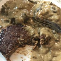 Vegan scratch-made biscuits and gravy with housemade vegan sausage patty. Comfort food to the max! at The Red Bird Cafe in Roslyn