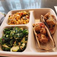 Taco plate with corn side and kale and brussels salad at DTW - Plum Market in Romulus