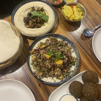 Falafels, iron salad (quinoa, mango and lentils), mushroom hummus w pita. Complimentary pickled veggies (too spicy for us!)  at Hummus Chiang Mai in Chiang Mai