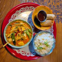 Gaeng Dang tofu curry with vegetable spring rolls at Rosa's Thai Cafe in Liverpool