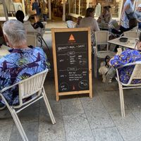 Vegan options listed on menu board  at Lusitania Cafe in Ferrol