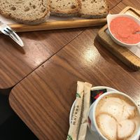 Tostadas pan casero con tomate batido y café con leche de avena, el mejor café de Ferrol at Lusitania Cafe in Ferrol