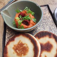 Tomato hummus and bread at Hügge in Turku