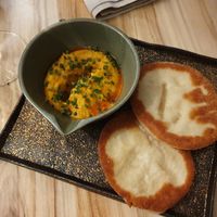 Flat bread and roasted carrot hummus at Hügge in Turku