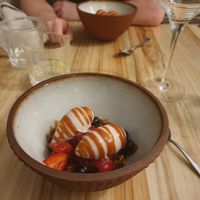 Strawberry and Thai basil sorbet on fresh berries at Hügge in Turku