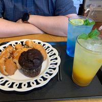 Pizza bread and a chocolate muffin, paired with blue lemon-ade and mango ade. at OOH Breado - Sangdo-dong - 우부래도 상도점 in Seoul