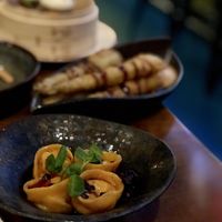 Pumpkin dumplings, served in a soy and chili sauce.  at Waipo in Stockholm
