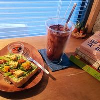 Tempeh and smashed avocado on thick fresh chewy toasted bread, and Oatley iced choco.. at Bottle Lounge 보틀팩토리 in Seoul