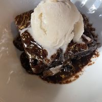 Vegan brownie with vegan ice cream   at Strip Joint - Pizzaplace & Drinkmonger in Glasgow