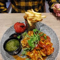 Cauliflower steak, salsa Verde, grilled tomato and mushroom, chips at Auchrannie Resort in Isle Of Arran