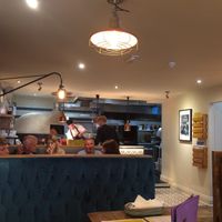 Open kitchen with pizza oven at Four London Road in Waterlooville