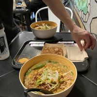 Foreground: spicy curry ramen. Miso macaroni. Background: dragon breath ramen.   at REDWHITE BONELESS RAMEN - Boston in Boston