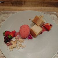 Super good vegan cheesecake with strawberry sorbet! at Pique Cafe in Tokyo