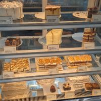 Dessert case -- most but not all are vegan at SIN - Prive - Jewel  in East Singapore