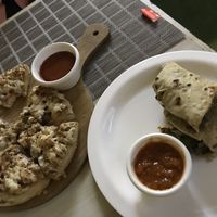 mushroom chili wrap & pizza  at Loving Hut - Vegan Paradise in Gurgaon