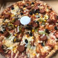 Delicious vegan pizza with olives, vegan sausage and peppers 😍🌿 at Papa John's in Romford