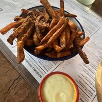 Also part if you order the tapas, sweet potato fries with a creamy garlic dip. at Bistro Calypso in Eindhoven