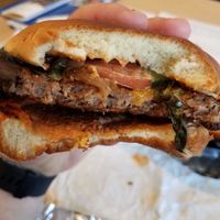 burger--bite shot at Can't Believe It's Not Meat - Hyde Park in Chicago