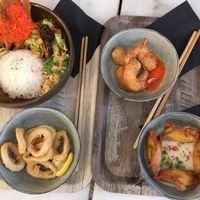 ‘Chicken’ and rice, prawn tempura, fried calamari and wontons at Liu Lin in Brussels