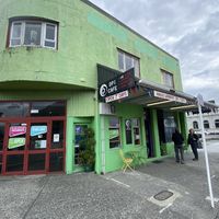 Outside, next to the river. Close to train station  at DP1 Cafe in Greymouth