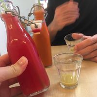 Watermelon and carrot juice with some separated ginger shots at Moak Pancakes - City Center in Amsterdam