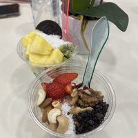 One is choc ice cream, one is vanilla. Both with vegan toppings   at Frozen FruYo in Rhodes