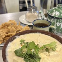 Crispy Oysters, Tofu/Tempe curry noodles + hot ginger tea  at Omiiku Mie 24 Jam in Ubud