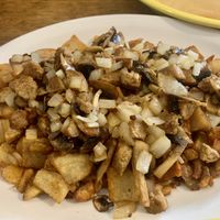 Vegan breakfast hash (without the green peppers).  SO GOOD!  I think they use Beyond sausage!  Really tasty seasoned potatoes, mushrooms & onion too!  at Deja Vu Diner in Orangeville