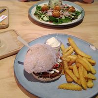 Black bean burger with fries, falafel wrap and sunshine smoothie at Combi in Eersel