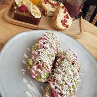 Freshly pressed orange juice. Acai vegan yoghurt. Toast with humus and cranberries.
Banana bread. And the amazing loaded avacado toast with lime mayo and chickpeas onions. at Combi in Eersel
