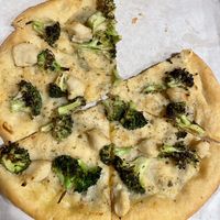 Cream cheese and broccoli kids pizza   at Secret Pizza Society in Portland