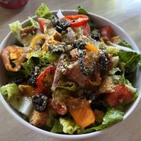 half an order of salad (one of two bowls)  at Secret Pizza Society in Portland