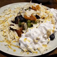 Delicious waffle with whipped cream at Wholywood in Paris
