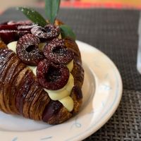 Best pistachio cream filled, topped with fresh cherries (what an interesting combo flavor) so good 😋   at April and May 45 꽃피는 4월 밀익는 5월 in Busan