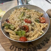 Vegan pasta with vegan cheese on top  at Marrobbio in Sliema