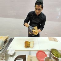 Watch them make your meal while you wait through viewing glass at N'Hambù in Salerno