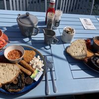 Vegan breakfast including: baked beans, hash brown, tomatoes, portobello, sausages, vegan black pudding and tofu .  at The Spa Hotel in Saltburn-by-the-sea