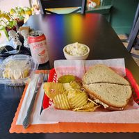 Enjoying a delightful lunch comprised of "Turkey Special " sandwich, homemade potato salad, lemon cake dessert, and exceptionally friendly service. at The Gentle Giant Cafe in Pitman