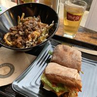 Vegan poutine and bbq tempeh sandwich at Copper Branch - Catherine E in Montreal