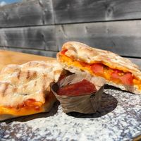 Yummie Cheazy Melt (photo made by Joey) at Pele Surf Shack in Hook Of Holland