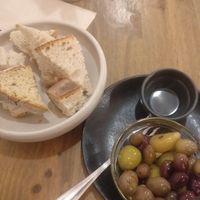 Olives and bread as a starter at O Gambuzino in Lisbon