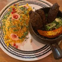 Marqa - stew with prunes, ras el hanout, shitake and walnut kafta, roasted Hokkaido pumpkin, broccoli, turnip, pomegranate, dukkah. at O Gambuzino in Lisbon