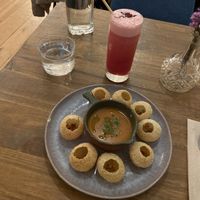 Pani puri with fermented gazpacho  at O Gambuzino in Lisbon