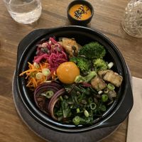 Bibimbap with vegan egg yolk  at O Gambuzino in Lisbon